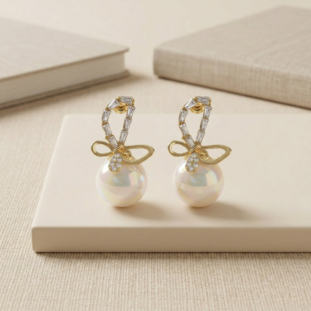 Designer Gold Plated Crystal Ribbon Earrings with Large Pearl Drop