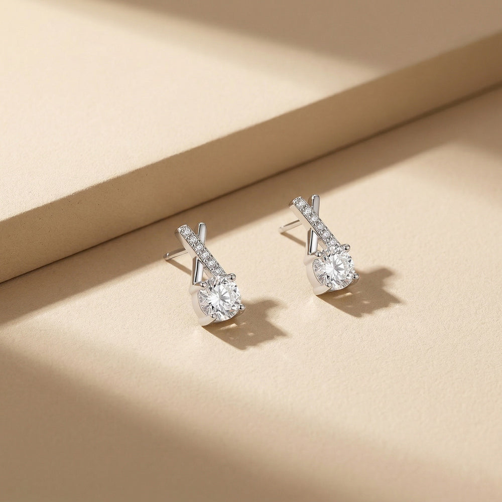 Elegant Silver Plated Criss-Cross Stud Earrings with Round Cut Cubic Zirconia
