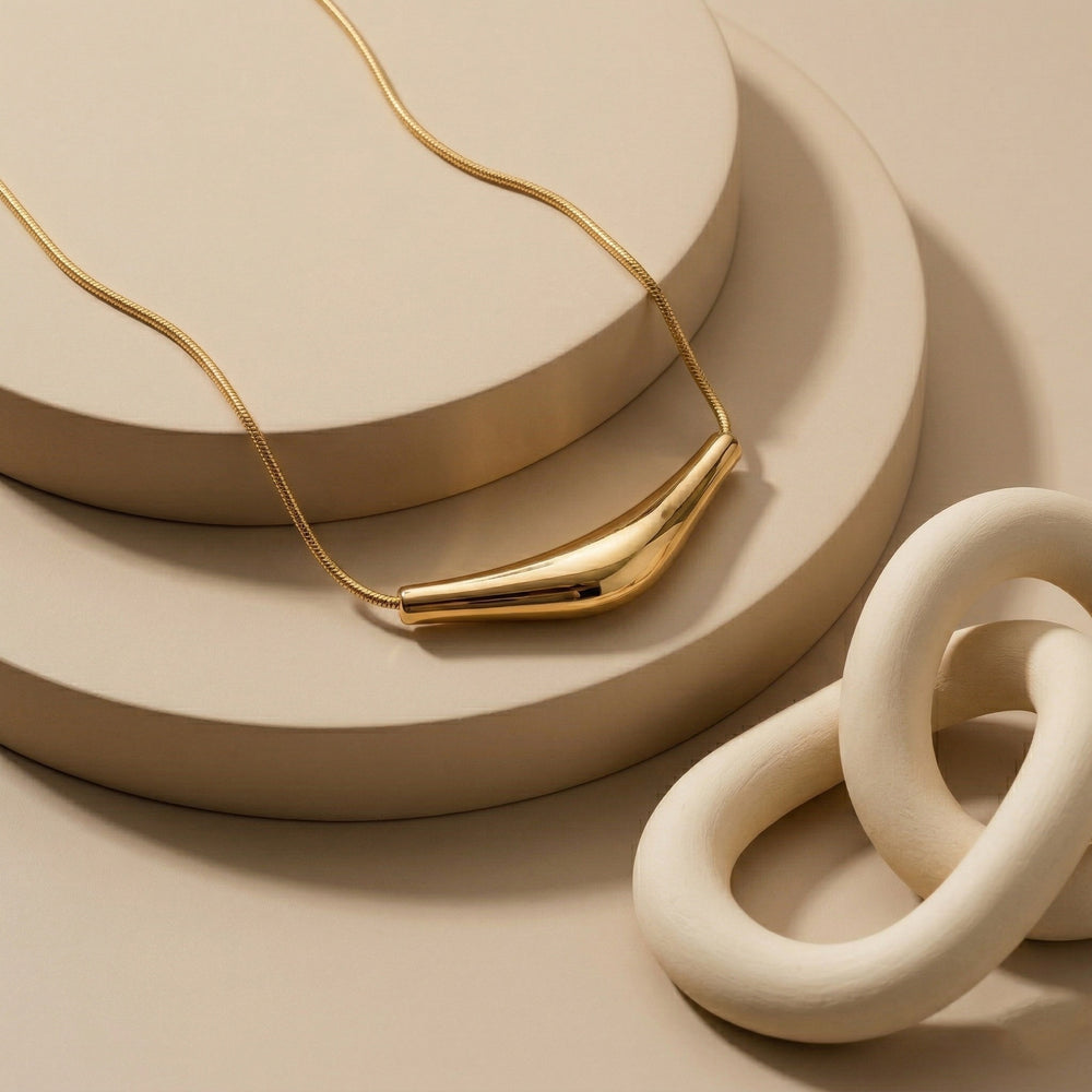Contemporary Arc Pendant on Sleek Snake Chain