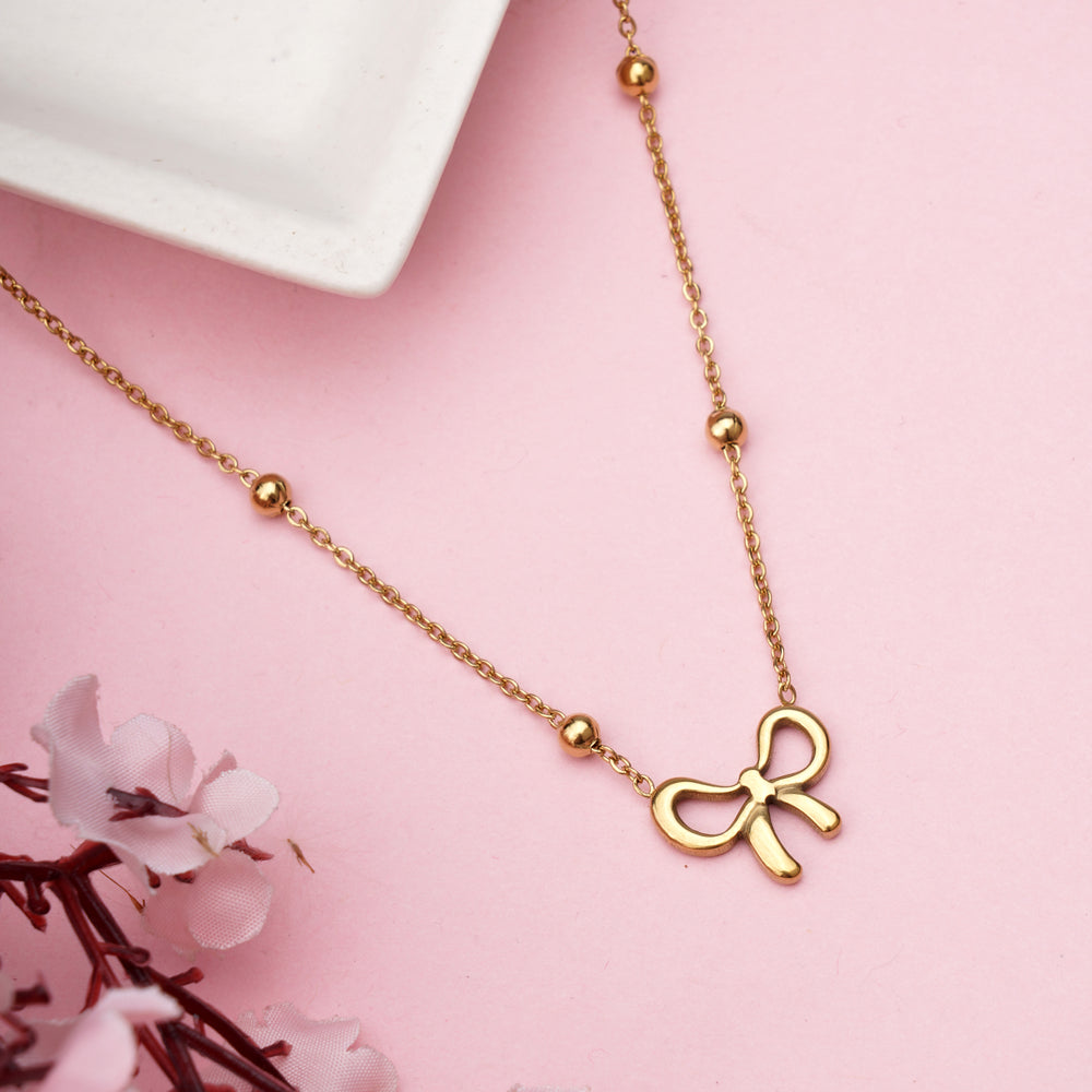 Elegant Gold Ribbon Bow Pendant Necklace with a Bead Chain