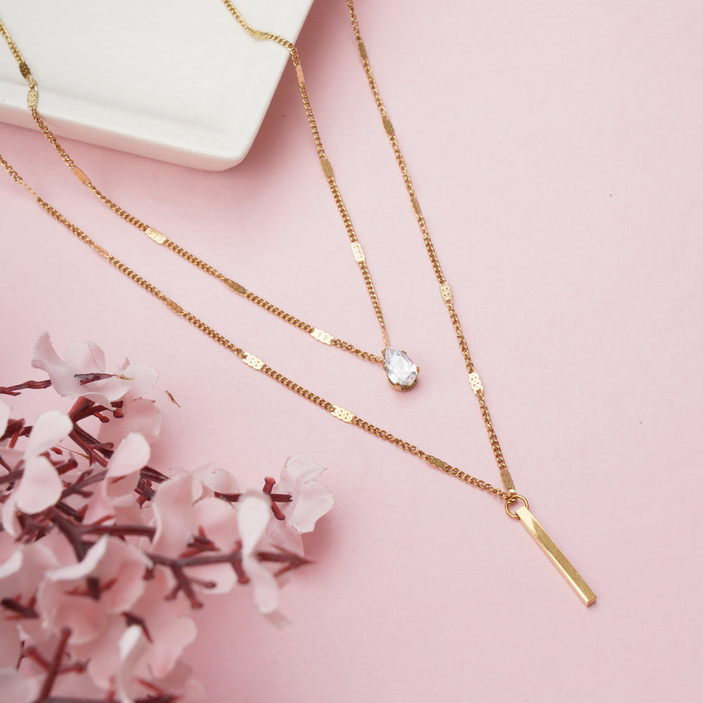 Double Layered Necklace with Pear Cut Crystal and Gold Bar Pendant