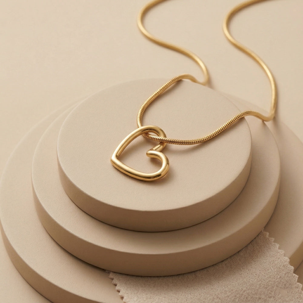 Dainty Gold Plated Open Heart Silhouette Pendant on Sleek Snake Chain