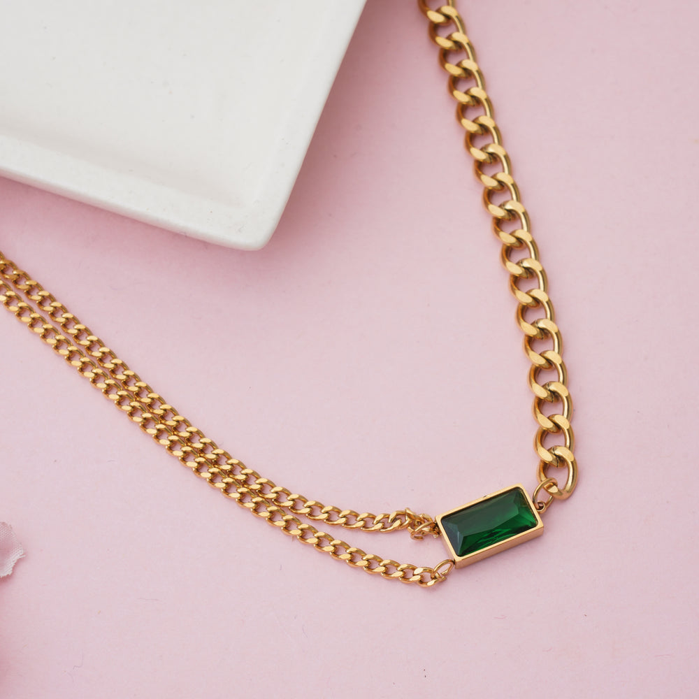 Modern Emerald Green Baguette Crystal Integrated into Bold Gold Curb Chain