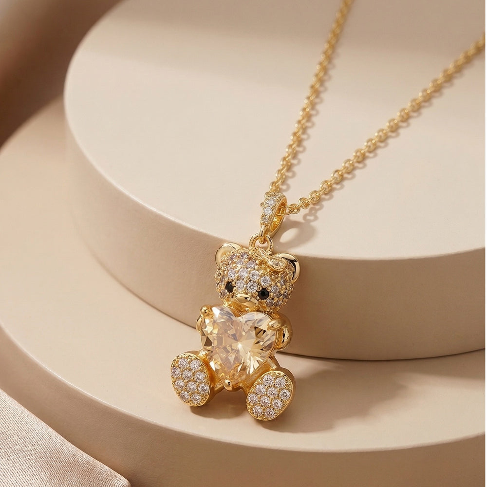 Crystal Studded Teddy Bear Pendant with a Heart Gemstone