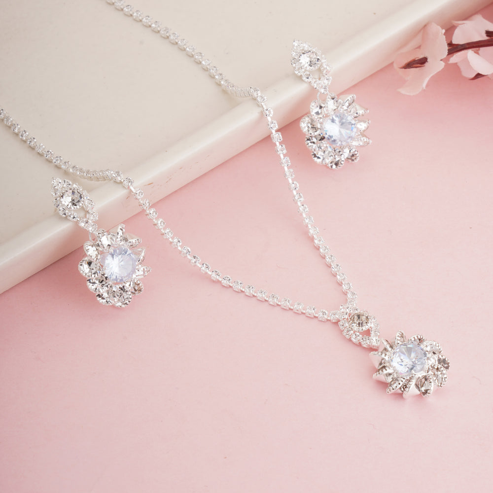 Elegant Silver-Plated Floral Crystal Pendant Necklace with Matching Drop Earrings