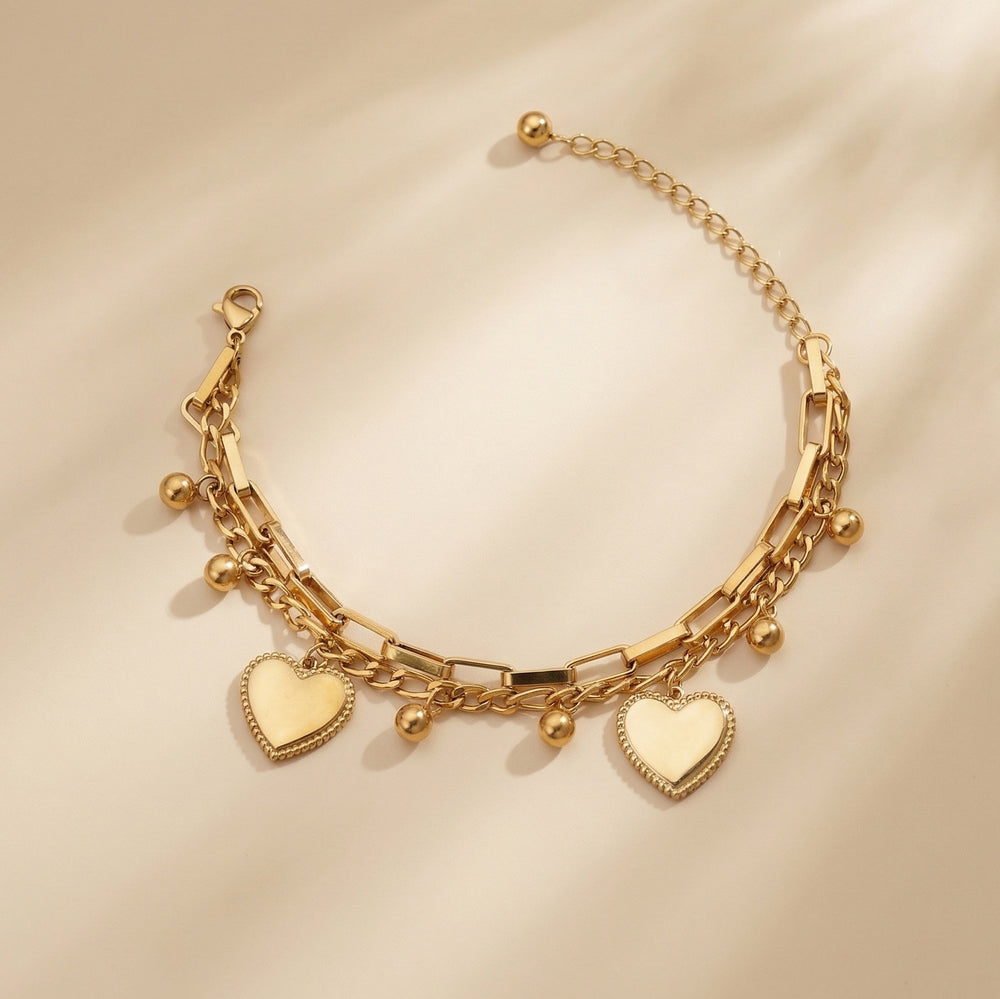 Stylish Heavy Statement Gold Bracelet with Heart and Ball Hangings for office party
