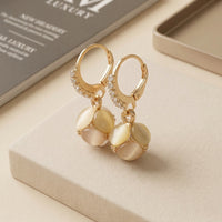 Modern Gold Plated Earrings with Round Peach Cat Eye Gemstone