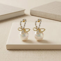 Designer Gold Plated Crystal Ribbon Earrings with Large Pearl Drop