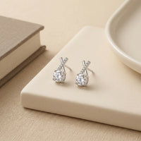 Elegant Silver Plated Criss-Cross Stud Earrings with Round Cut Cubic Zirconia