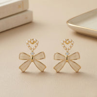 Dainty Gold Plated Pearl-Encrusted Heart and Beige Bow Drop Earrings