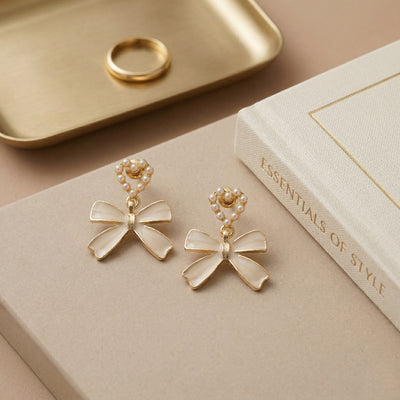 Dainty Gold Plated Pearl-Encrusted Heart and Beige Bow Drop Earrings - Second Image