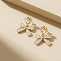 Dainty Gold Plated Pearl-Encrusted Heart and Beige Bow Drop Earrings