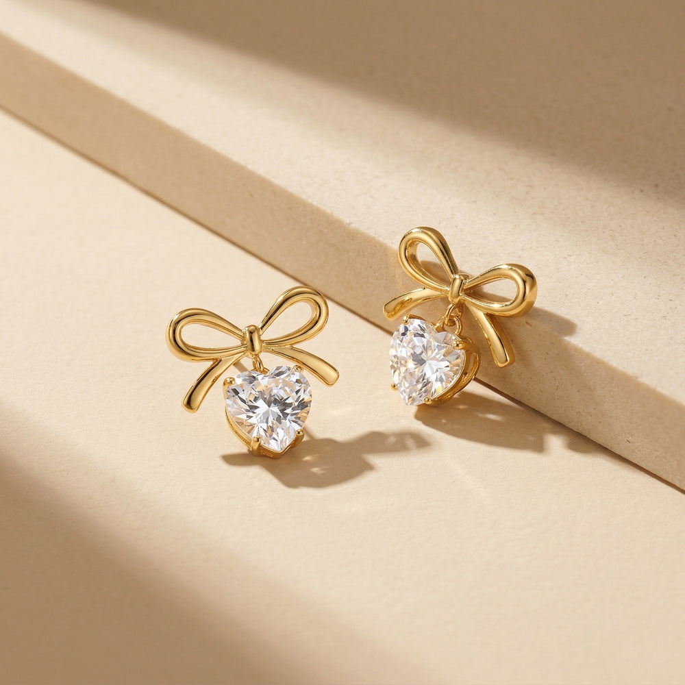 Romantic Gold Plated Ribbon Bow Dangle Earrings with Heart-Cut Cubic Zirconia drop