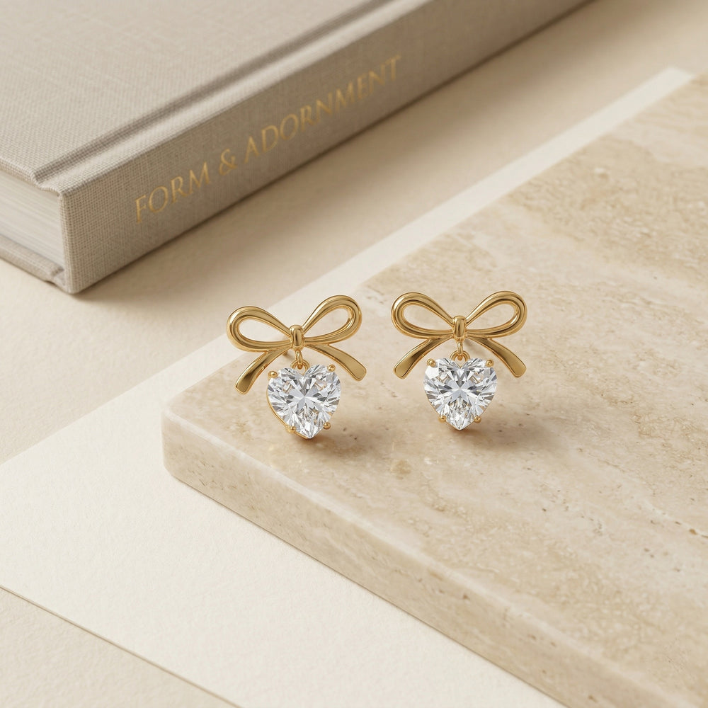 Romantic Gold Plated Ribbon Bow Dangle Earrings with Heart-Cut Cubic Zirconia drop