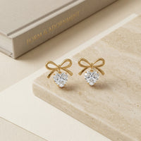 Romantic Gold Plated Ribbon Bow Dangle Earrings with Heart-Cut Cubic Zirconia drop