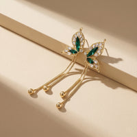 Luxury Gold Plated Butterfly Wing Chain Earrings with Emerald Green Marquise Crystals