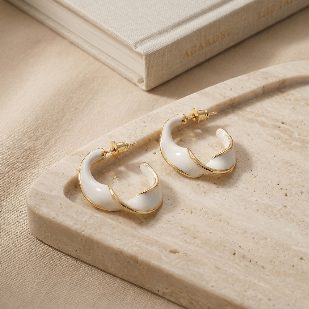 Contemporary Gold Plated Irregular Wavy C-Hoop Earrings with Creamy White Enamel Finish