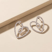 Elegant Rhodium Plated Open Heart Stud Earrings Encrusted with Brilliant White Zirconia