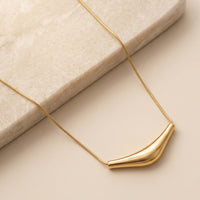 Contemporary Arc Pendant on Sleek Snake Chain