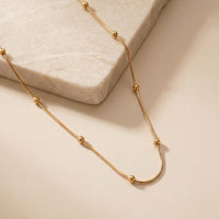 Sleek Gold Bead Snake Chain Necklace