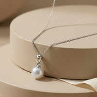 Timeless Round White Pearl Solitaire Pendant on Box Chain