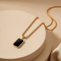 Sophisticated Black Onyx Style Rectangular Pendant with Engraved Backing