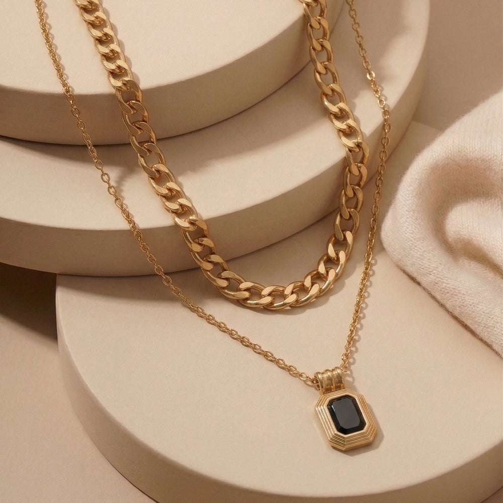 Trendy Double Layered Necklace with Gold Figaro Chain and black pendant
