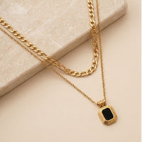 Trendy Double Layered Necklace with Gold Figaro Chain and black pendant