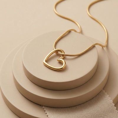 Dainty Gold Plated Open Heart Silhouette Pendant on Sleek Snake Chain