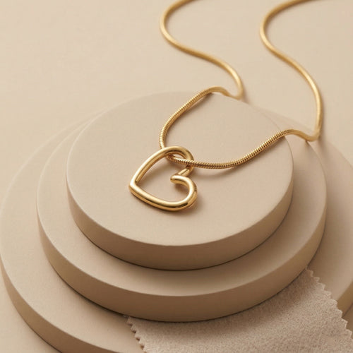 Dainty Gold Plated Open Heart Silhouette Pendant on Sleek Snake Chain