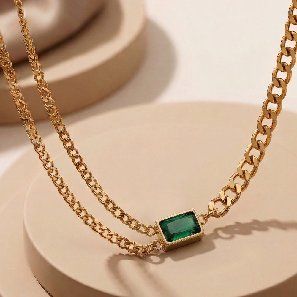 Modern Emerald Green Baguette Crystal Integrated into Bold Gold Curb Chain