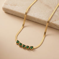Luxury Multi-Heart Emerald Gemstone Choker on flat Herringbone Snake Chain