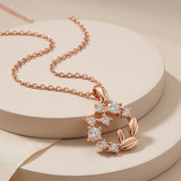 Elegant Rose Gold Floral Wreath Pendant with Crystal Accents