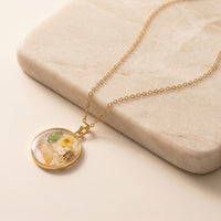 Minimalist Circular Resin Necklace with Real Pressed Yellow Buttercup