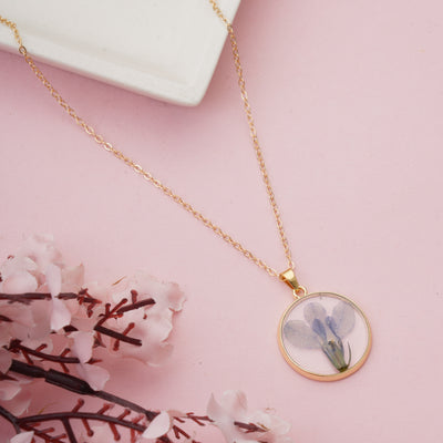 Dainty Circular Resin Necklace with Real Pressed Lavender-Tone Petals - Second Image