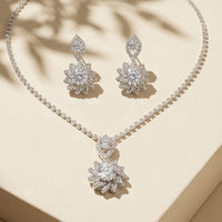Elegant Silver-Plated Floral Crystal Pendant Necklace with Matching Drop Earrings