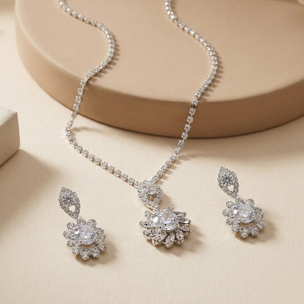 Elegant Silver-Plated Floral Crystal Pendant Necklace with Matching Drop Earrings