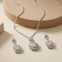 Elegant Silver-Plated Floral Crystal Pendant Necklace with Matching Drop Earrings