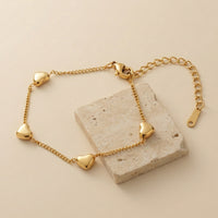 Romantic Gold Toned Heart Shaped Charm Bracelet for Gifting for Girlfriend