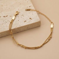 Triple Layered Daily Wear Gold Plated Snake Chain Bracelet with Beads