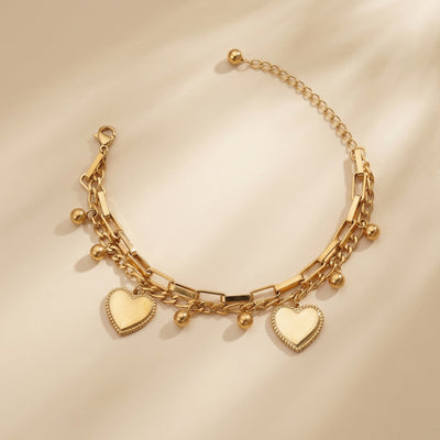 Stylish Heavy Statement Gold Bracelet with Heart and Ball Hangings for office party